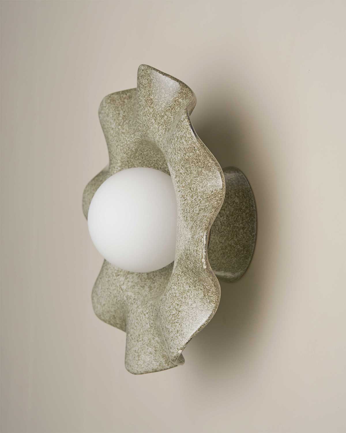 Pearl Sconce Light in Rivergum