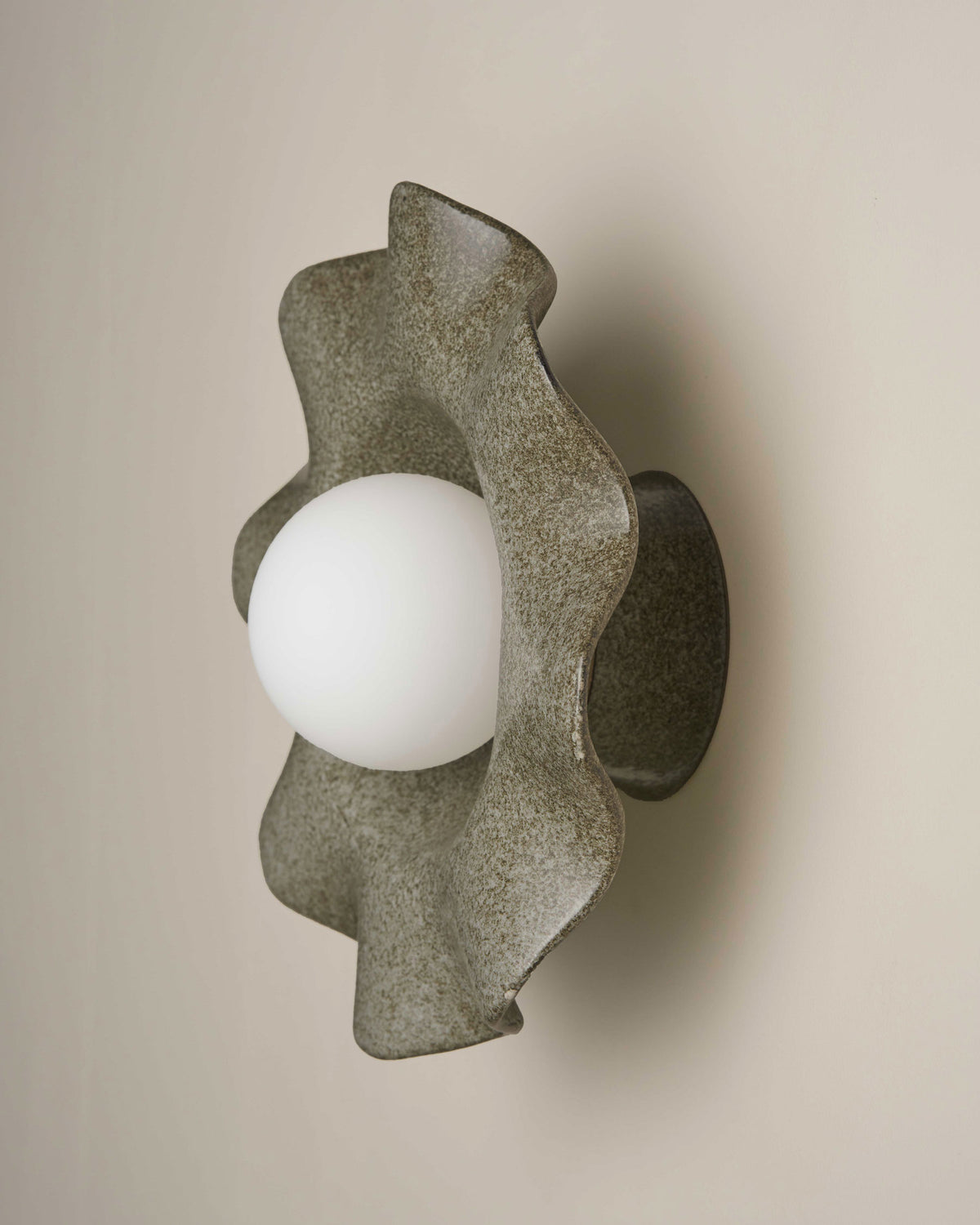 Pearl Sconce Light in Rivergum