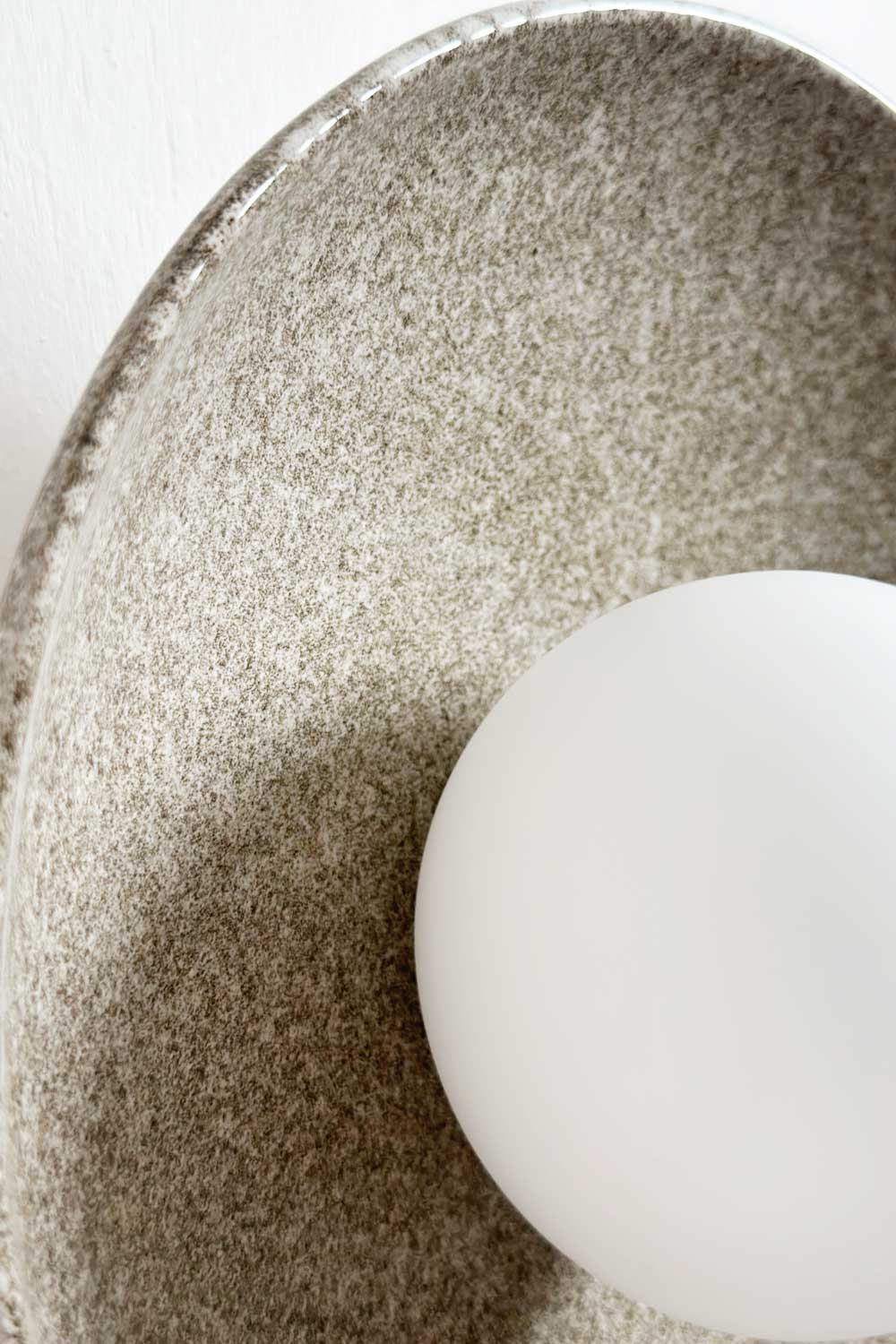 Dish Sconce Light in Rivergum