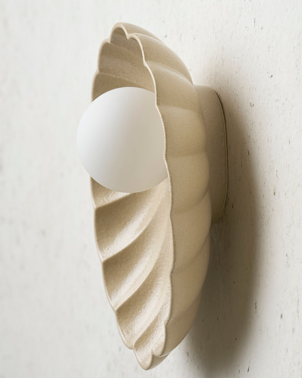 Oyster Sconce Light in Sand
