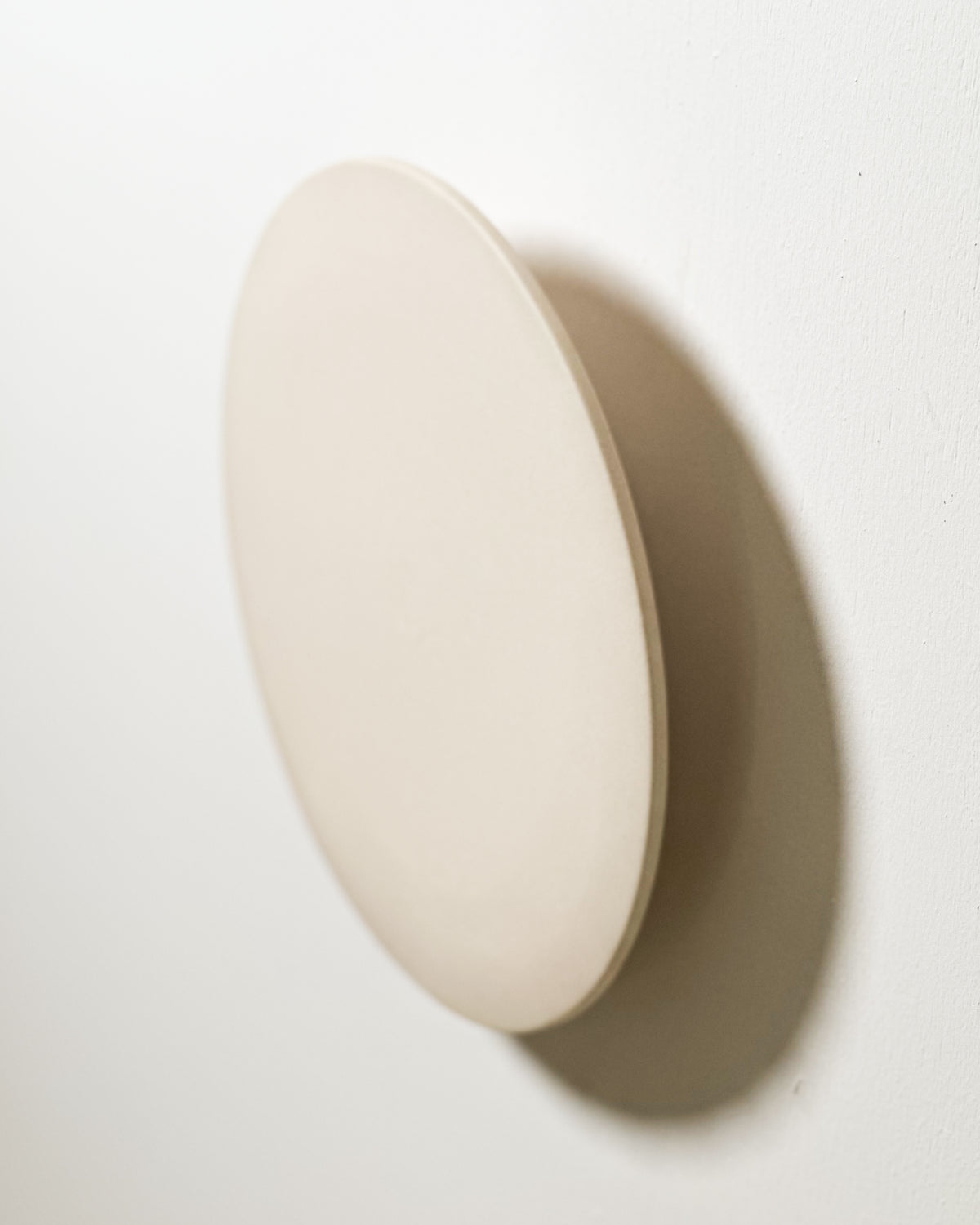 Small Backlit Disc Wall Light in Bone