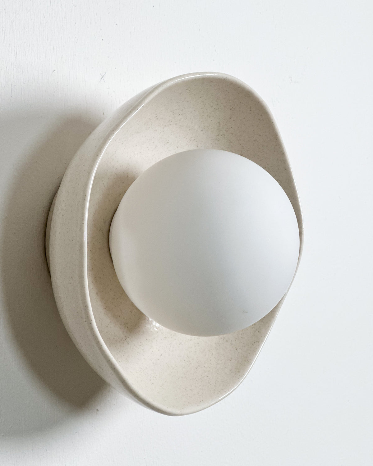 Shell Sconce Light in Poppyseed
