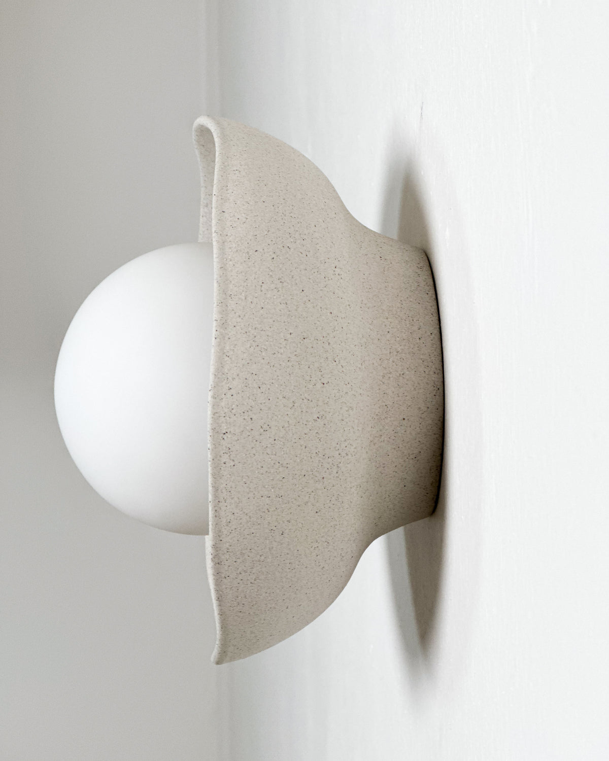 Shell Sconce Light in Stone