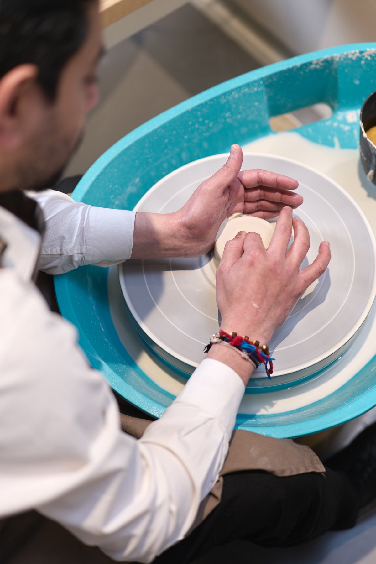 Book a Wheel Throwing Workshop &gt;