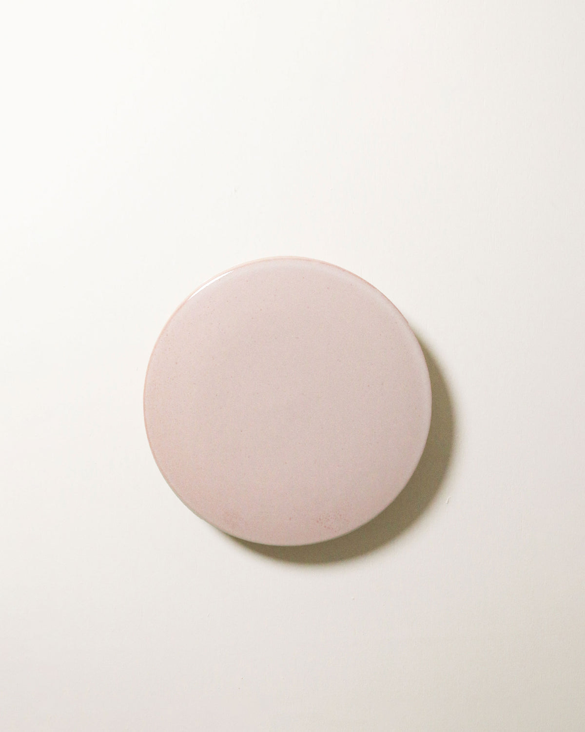 Small Backlit Disc Wall Light in Rose Quartz