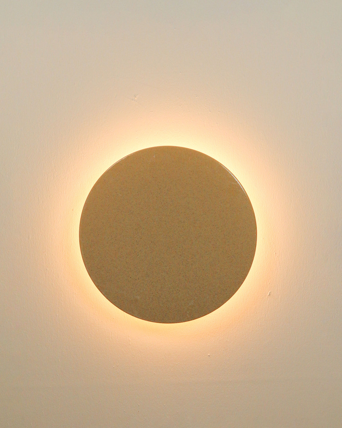 Small Backlit Disc Wall Light in Sand