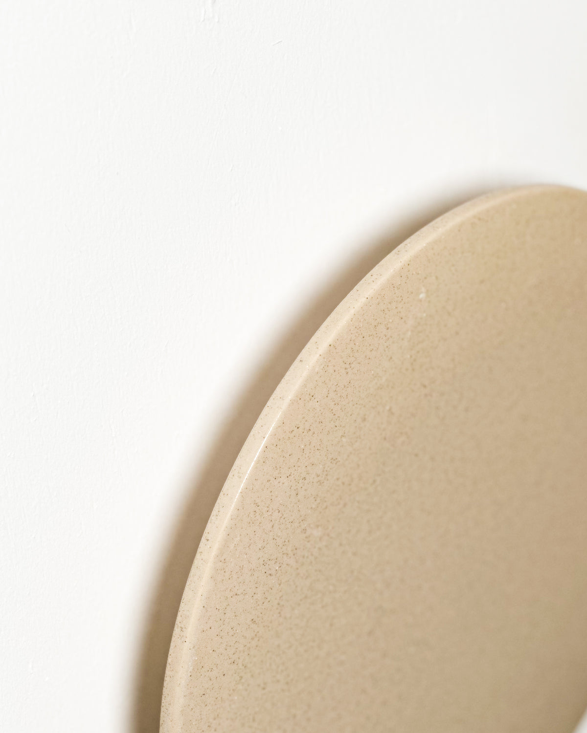 Small Backlit Disc Wall Light in Sand