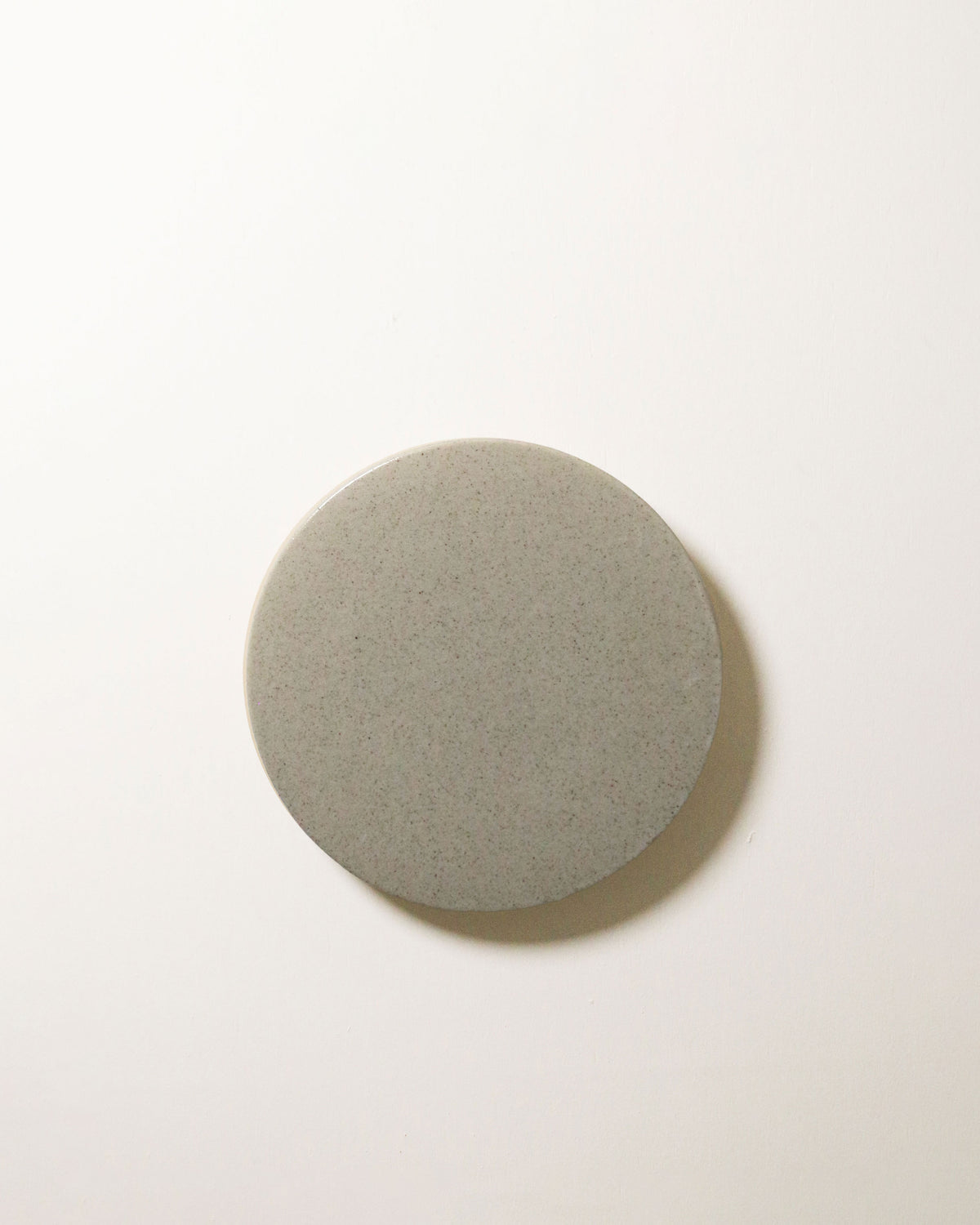 Small Backlit Disc Wall Light in Stone