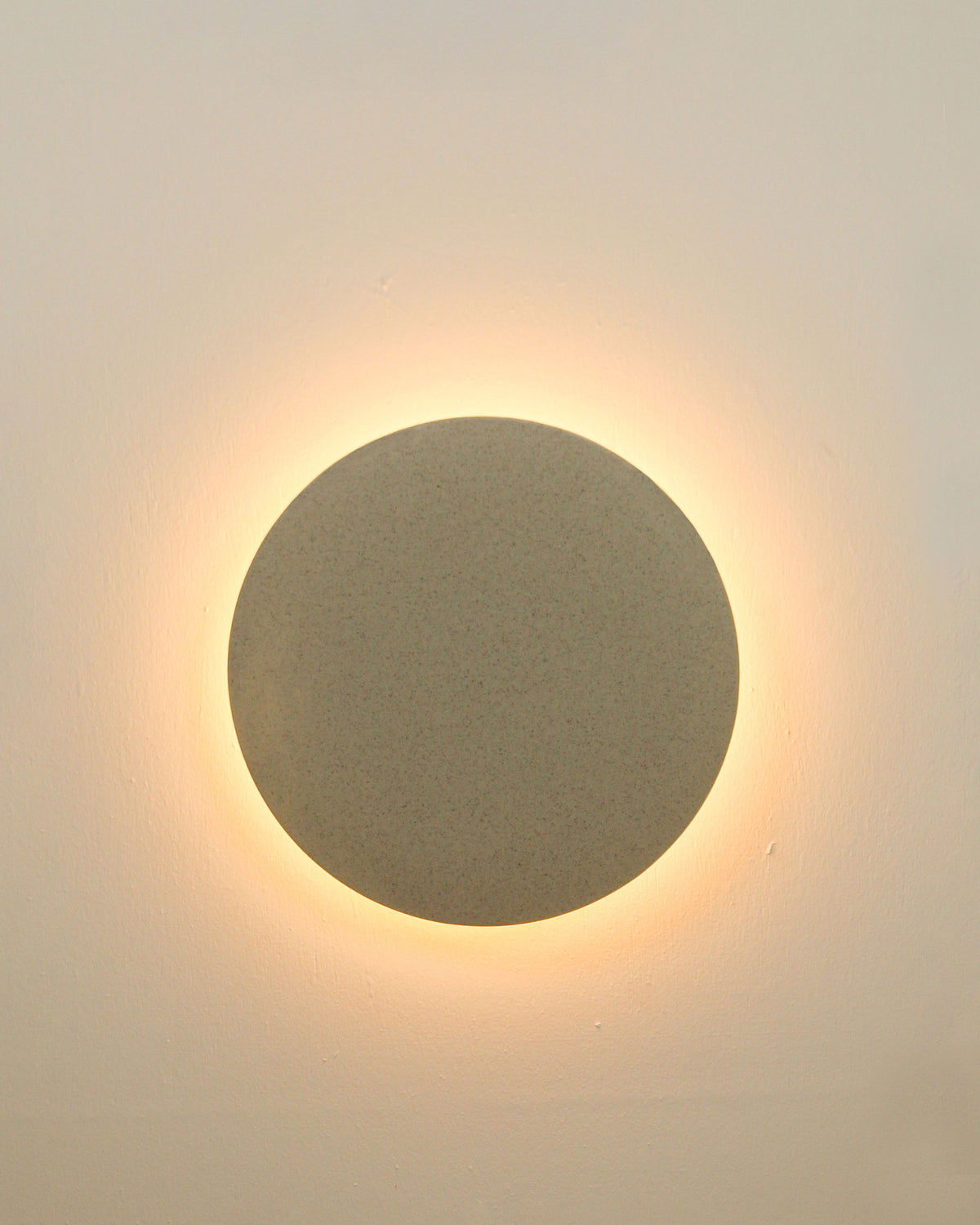 Small Backlit Disc Wall Light in Stone