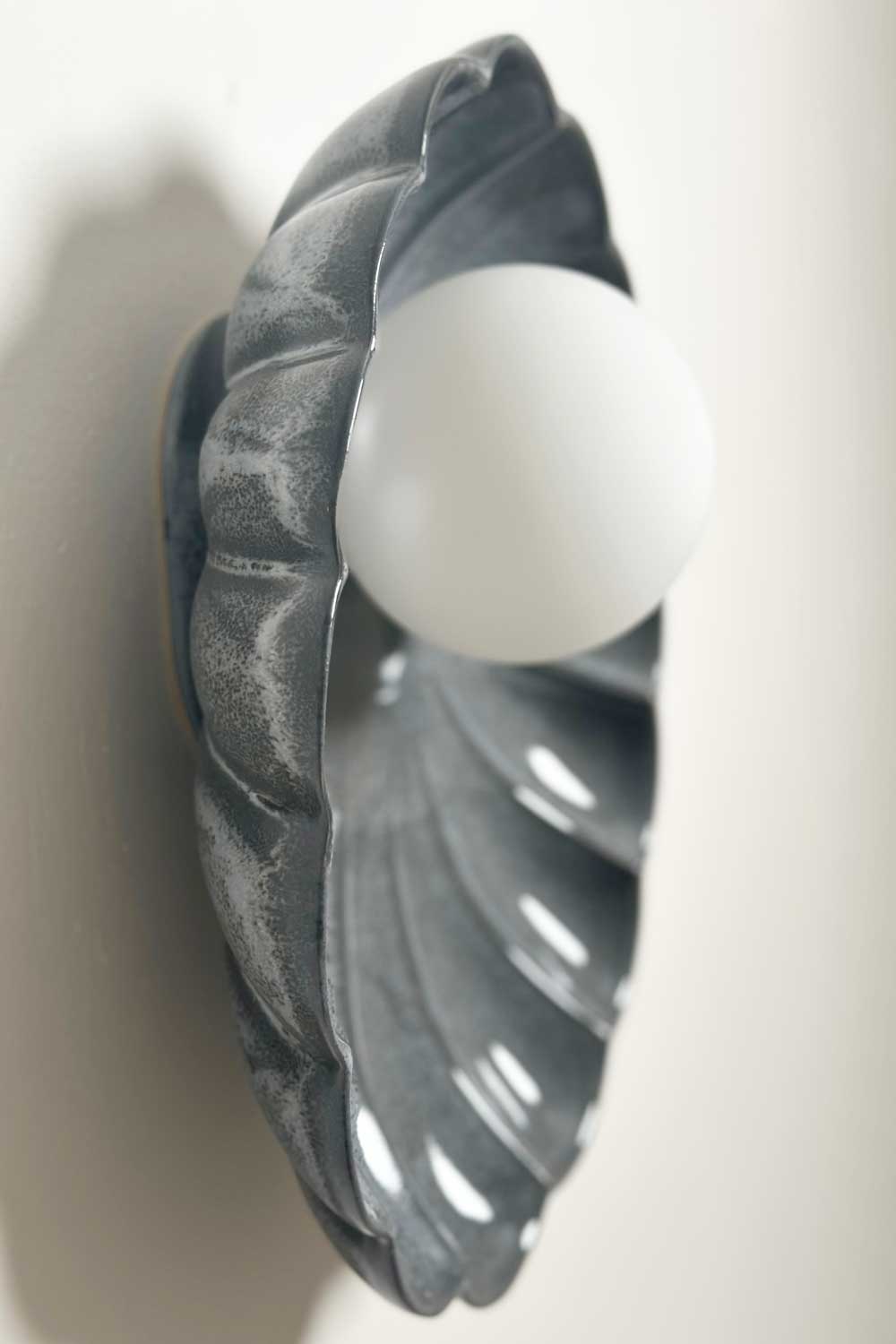 Oyster Sconce Light in Storm